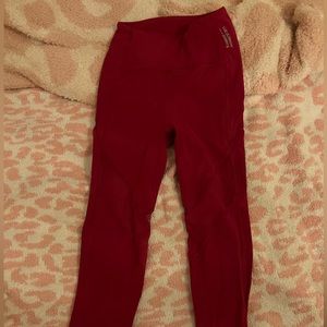 Lululemon x Barry’s leggings dark red with mesh and pockets size 2